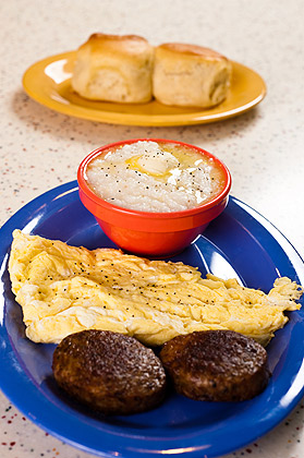 3 eggs any style with sausage or bacon and two sides